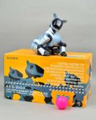 A BOXED SONY AIBO ERS-210A ENTERTAINMENT ROBOT, not tested but with battery pack, memory stick,