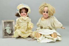 TWO ARMAND MARSEILLE BISQUE HEAD DOLLS, the first nape of neck marked 'Made in Germany Armand