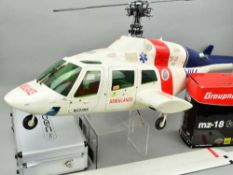 A HIROBO SHUTTLE RADIO CONTROL BELL 222 HELICOPTER KIT, built to a fair standard and modelled as