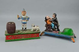 TWO REPRODUCTION CAST IRON MECHANICAL MONEY BOXES, one in the form of a Dentist and Patient, the