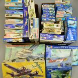 A COLLECTION OF REVELL MODEL AIRCRAFT KITS, in two boxes and loose containing over 40 kits, scale