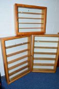 THREE GLASS FRONTED WALL MOUNTED WOODEN DISPLAY CABINETS, sizes approximately 56cm wide x 14cm