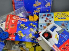 A QUANTITY OF BOXED AND UNBOXED MODERN MECCANO ITEMS, Evolution etc, with a quantity of instructions