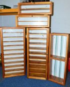 FIVE GLASS FRONTED WALL MOUNTED WOODEN DISPLAY CABINETS, sizes approximately 36cm wide x 19cm deep x