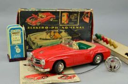 A BOXED SCHUCO ELEKTRO PHANOMENAL CAR, No.5503, red tinplate Mercedes-Benz 190SL, appears complete