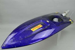 A RADIO CONTROL SPEEDBOAT, complete with CMB 67 engine and remote control receiver unit, no