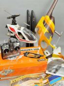 A KYOSHO CONCEPT 30 HUGHES 500 HELICOPTER BODY KIT, size 28-32, part assembled but contents not