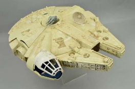 AN UNBOXED KENNER STAR WARS MILLENNIUM FALCON, playworn condition, but appears largely complete with
