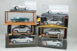 A QUANTITY OF BOXED MODERN DIECAST VEHICLES, all 1:18 scale, Solido and Maisto including models