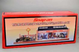 A BOXED CROWN PREMIUMS SNAP-ON THUNDERING 30'S SERVICE STATION DISPLAY MODEL, No.2403625, contents