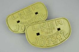 A PAIR OF L.N.E.R TYPE D CAST IRON WAGON PLATES, No.303992, Darlington 1947, fronts repainted green,