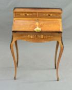 AN EARLY 20TH CENTURY ROSEWOOD AND INLAID BUREAU DE DAME, the raised back with heart shaped