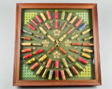 A SHOTGUN CARTRIDGE DISPLAY BOARD, the cartridges were made by I.C.I. and date from before 1956 when