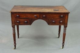 AN EARLY VICTORIAN MAHOGANY DRESSING TABLE, the rectangular top above an arrangement of four