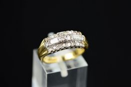 A LATE 20TH CENTURY 18CT GOLD DIAMOND DRESS RING, set with eight cut, baguette cut and modern