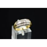 A LATE 20TH CENTURY 18CT GOLD DIAMOND DRESS RING, set with eight cut, baguette cut and modern