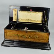 A LATE 19TH CENTURY MOJON MANGER & CO INTERCHANGEABLE MUSIC BOX, circa 1890, the walnut, ebonised
