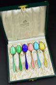 A CASED SET OF SIX KRISTIAN HESTENES OF NORWAY HARLEQUIN ENAMELLED COFFEE SPOONS, stamped