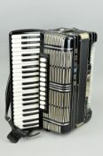 A CASED HOHNER MORINO VN FIVE VOICE 120 BRASS ACCORDIAN, black case, with eleven settings and