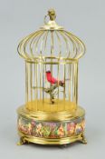 A REUGE MUSIC SAINTE CROIX REPRODUCTION AUTOMATON SINGING BIRD IN A CAGE, the cage with Capo di