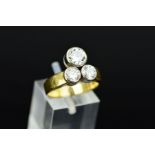 A LATE 20TH CENTURY 18CT GOLD TREFOIL DESIGN DIAMOND RING, comprised of three modern round brilliant