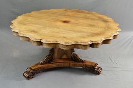 A WILLIAM IV ROSEWOOD TILT TOP BREAKFAST TABLE, of wavy circular form, on a concave triangular