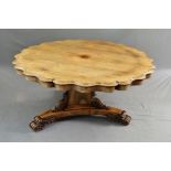 A WILLIAM IV ROSEWOOD TILT TOP BREAKFAST TABLE, of wavy circular form, on a concave triangular
