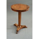 AN EARLY VICTORIAN ROSEWOOD OCCASIONAL TABLE, the circular top on a tapered octagonal column to a