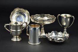 A GEORGE V SILVER PEDESTAL BON BON DISH, of circular form with crenellated rim above foliate pierced