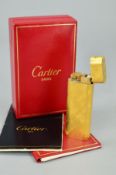 A CARTIER LIGHTER, the lighter with brushed effect finish, signed Cartier Paris, stamped 30526T,