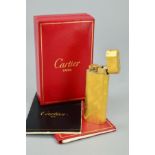 A CARTIER LIGHTER, the lighter with brushed effect finish, signed Cartier Paris, stamped 30526T,
