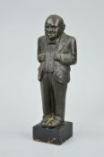 A MID 20TH CENTURY BRONZE FIGURE OF SIR WINSTON CHURCHILL, modelled wearing three piece suit and bow