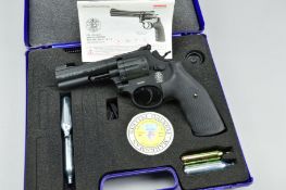A CASED UMAREX .177'' CO2 SMITH & WESSON LICENSED COPY OF THEIR MODEL 586 REVOLVER, it has a 4''