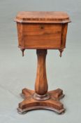 A VICTORIAN MAHOGANY TEAPOY, of extended octagonal form, the hinged top opening to reveal two fitted