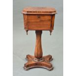 A VICTORIAN MAHOGANY TEAPOY, of extended octagonal form, the hinged top opening to reveal two fitted