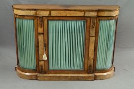 A VICTORIAN WALNUT AND INLAID CREDENZA, of bowed breakfront form, the frieze brass moulding and