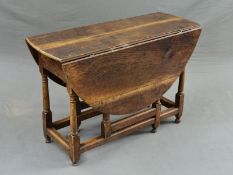 AN 18TH CENTURY AND LATER OVAL GATE LEG TABLE, fitted with a single end drawer, on block and