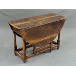 AN 18TH CENTURY AND LATER OVAL GATE LEG TABLE, fitted with a single end drawer, on block and