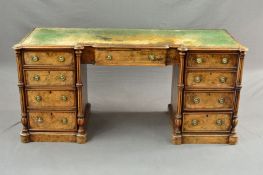 A VICTORIAN BURR WALNUT DESK, of inverted breakfront form, tooled green leather inset top above a