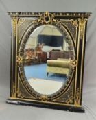 A VICTORIAN EBONISED AND GILT OVERMANTEL MIRROR, the rectangular frame with moulded pediment and