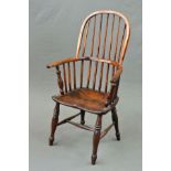 A 19TH CENTURY STAINED ASH WINDSOR HOOP AND SPINDLE BACK ARMCHAIR, dished seat, turned legs and '