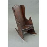 A 19TH CENTURY STAINED BEECH CHILD'S ROCKING CHAIR, of shepherd's chair design, height 71cm