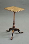 A VICTORIAN ROSEWOOD THREE TIER WHATNOT, (sun bleached), of shaped rectangular form, the top tier