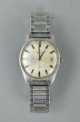 AN OMEGA AUTOMATIC STAINLESS STEEL GENTS WRISTWATCH, date aperture, working, very worn
