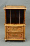 A VICTORIAN BURR WALNUT CANTERBURY, of rectangular form, with brass gallery to top above an open