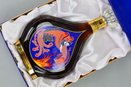 A BOTTLE OF COURVOISIER EXTRA COGNAC FROM COLLECTION ERTE, bottle No.4503, in a presentation box but