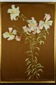 A LATE 19TH/EARLY 20TH CENTURY EMBROIDERY OF LILIES, worked in silks on a brown silk ground, later