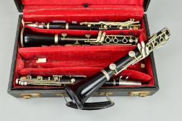 A SELMER STERLING CLARINET SERIAL NO. 166850, with white metal mounts, together with another