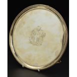 A GEORGE III ELIZABETH JONES SILVER SALVER, beaded rims, the centre engraved with coat of arms, on