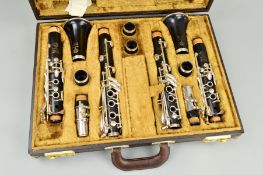 A PAIR OF SELMER SERIES 105 CLARINETS, serial numbers D5049 and D5297, with white metal fittings, in